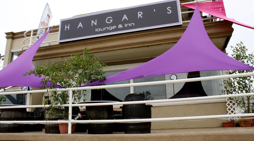 Inn Flight Suites Piarco Bagian luar foto