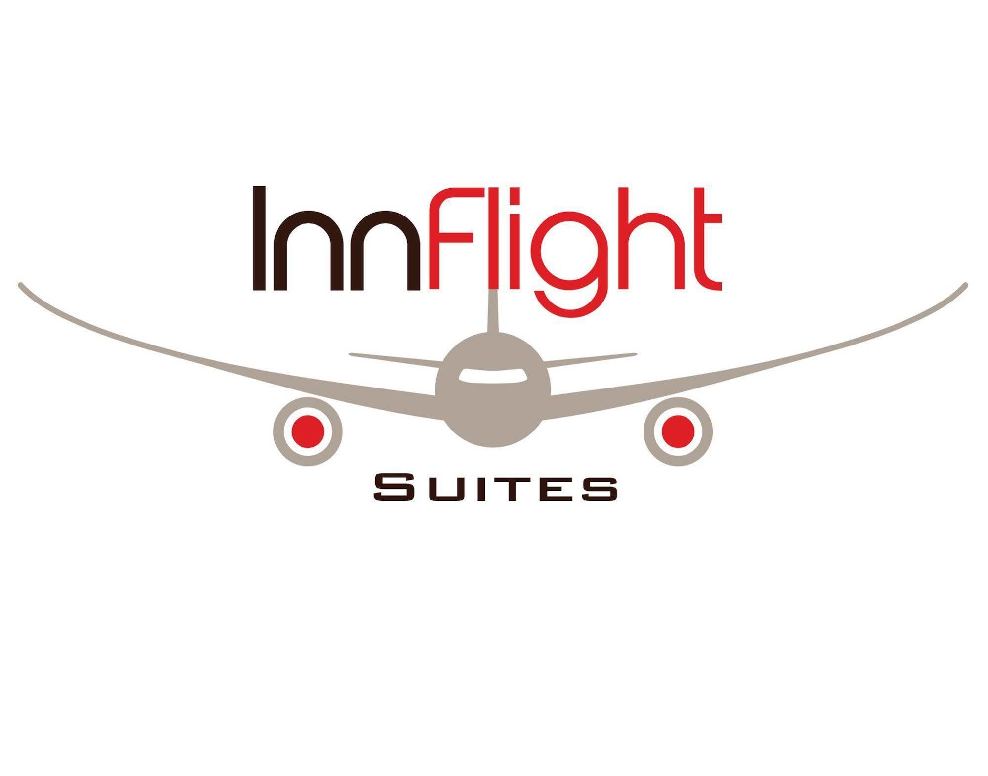 Inn Flight Suites Piarco Bagian luar foto